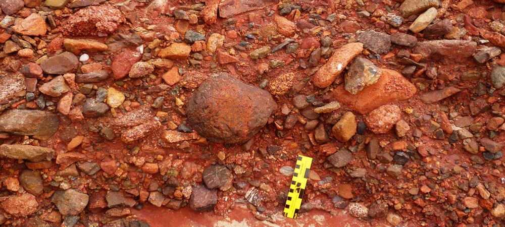 Angular clasts indicating proximal source, from an alluvial fan facies